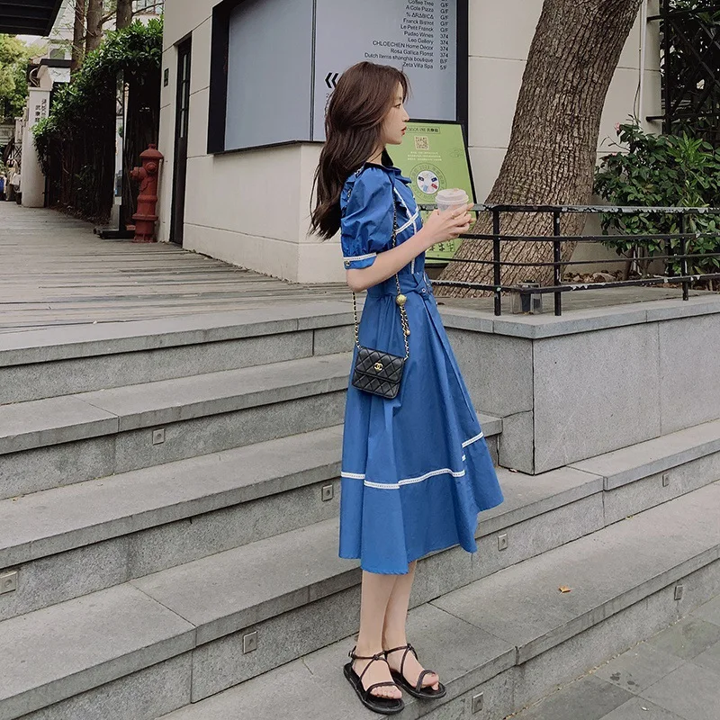 Mėlynos spalvos siūlėmis nėrinių retro suknelė su diržo moterims
